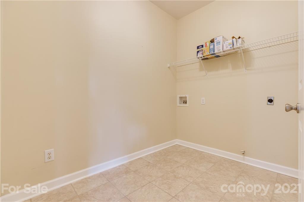 305 Savannah Lane Fort Mill, SC 29708 - Photo 36 of 46 a view of a room with racks on the wall