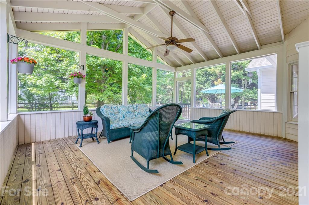305 Savannah Lane Fort Mill, SC 29708 - Photo 38 of 46 a view of a dining room with furniture window and wooden floor