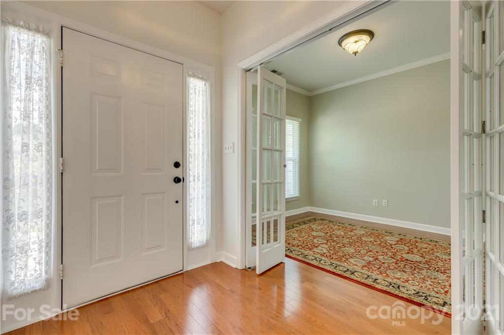 305 Savannah Lane Fort Mill, SC 29708 - Photo 5 of 46 an entryway at an empty room and window