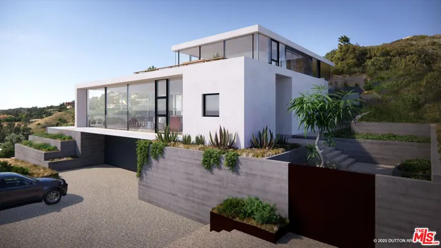 a living room with a large window and a table