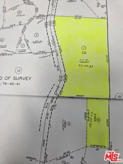 a picture of a bench in front of a window