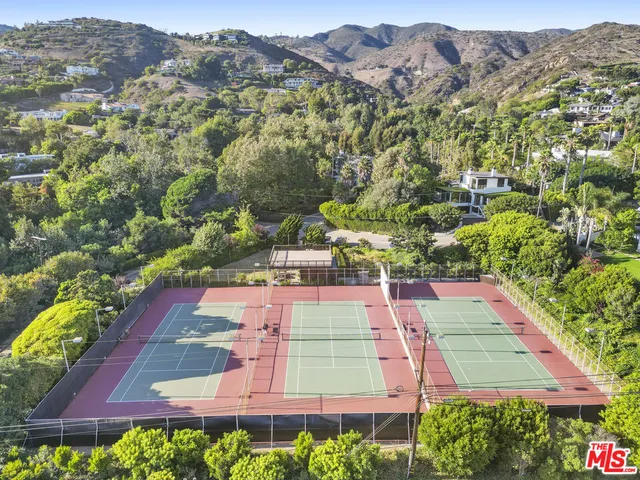 a view of a lake with mountains in the background