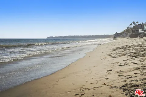 a view of swimming pool from a balcony