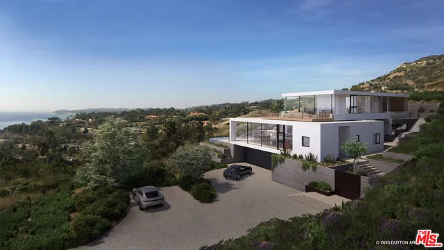 a view of a room with wooden floor and chair