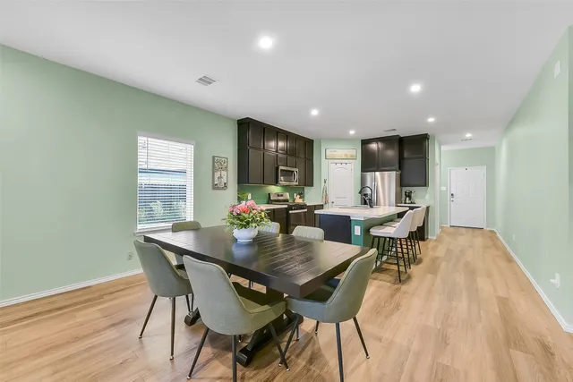 a view of a dining room with furniture