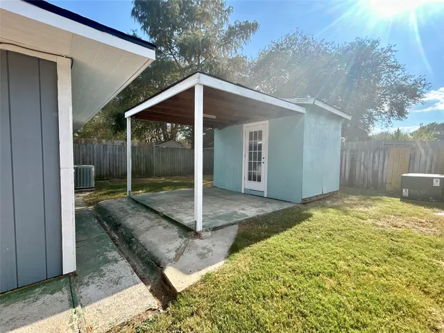 a view of backyard of house