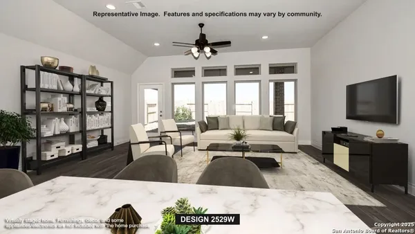 a living room with furniture a chandelier and a flat screen tv