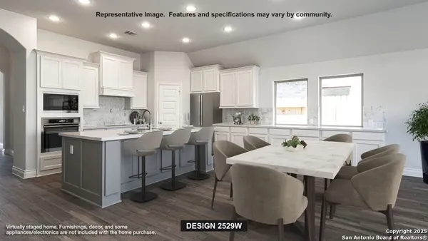 a kitchen with a stove a sink a dining table and chairs