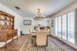 4301 Winding Way Benbrook, TX 76126 - Photo 12 of 25 Dining room with a chandelier and wood finished floors