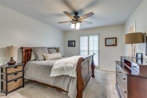 4301 Winding Way Benbrook, TX 76126 - Photo 21 of 25 Bedroom featuring a ceiling fan and light carpet