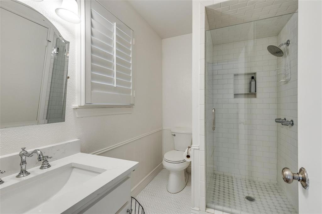 4301 Winding Way Benbrook, TX 76126 - Photo 22 of 25 Bathroom featuring a shower stall, vanity, and light tile patterned floors