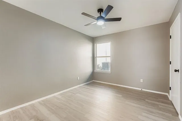 a bathroom with a tub sink and shower