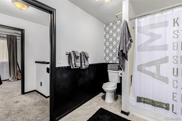 a bathroom with a sink and a shower