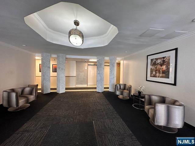 77 Prospect Avenue, Unit 1A Hackensack, NJ 07601 - Photo 15 of 16 a living room with furniture and a large window
