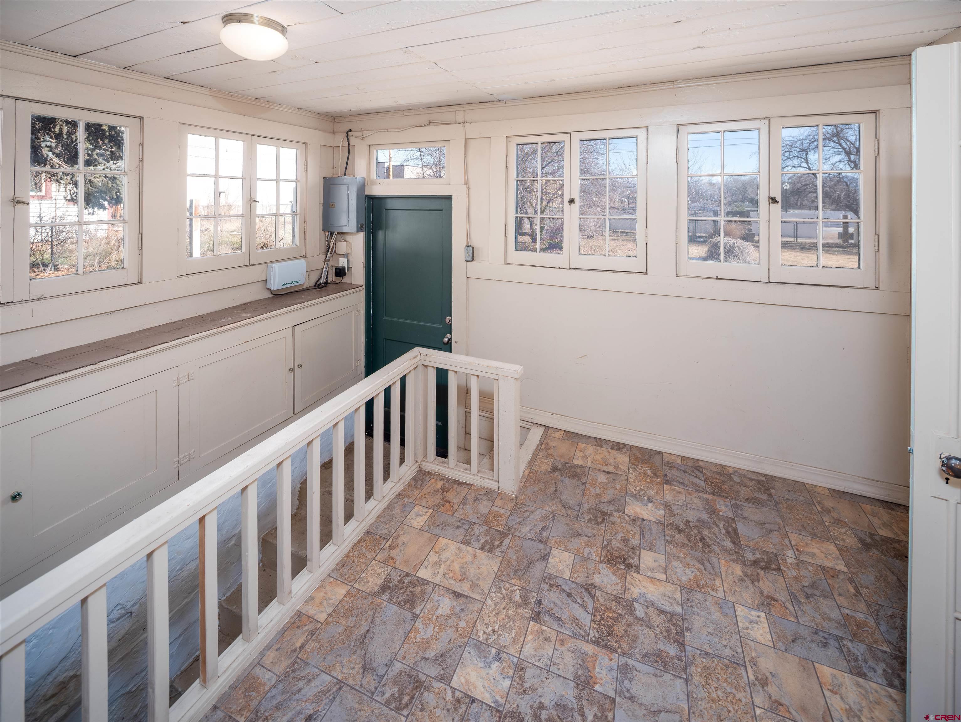 144 South Market Street Cortez, CO 81321 - Photo 13 of 41 a view of an empty room with a window