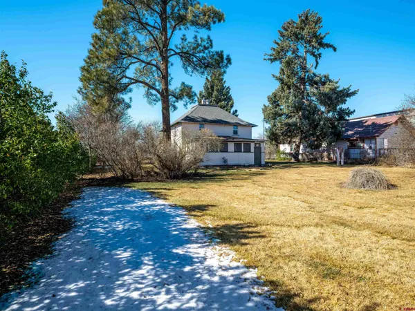 a house view with a swimming pool