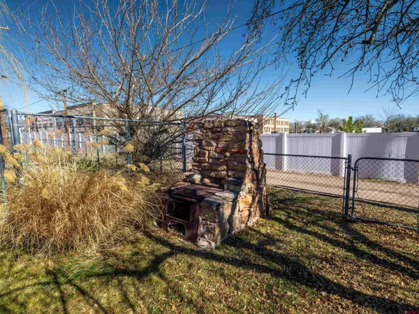 a view of a backyard of the house