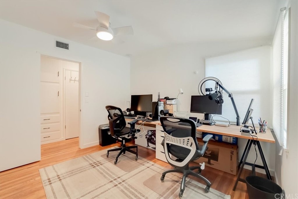 13040 Delano Street Van Nuys, CA 91401 - Photo 23 of 64 a view of a workspace with furniture and a window