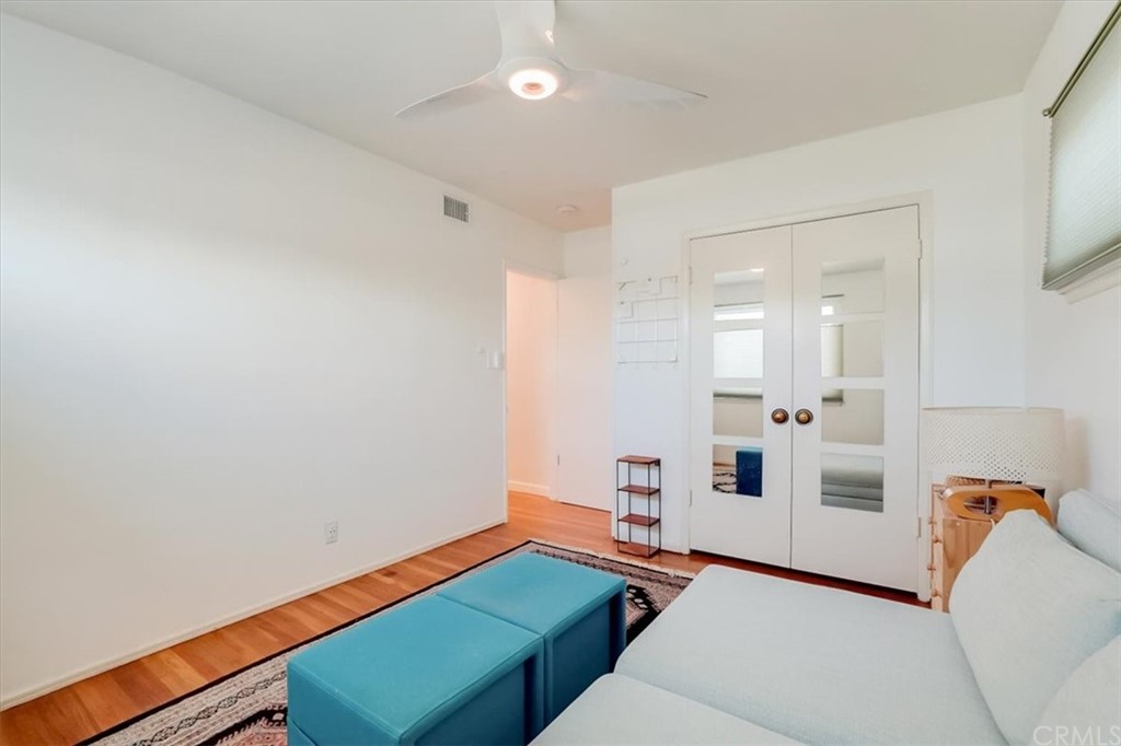 13040 Delano Street Van Nuys, CA 91401 - Photo 26 of 64 a room with furniture and view of kitchen