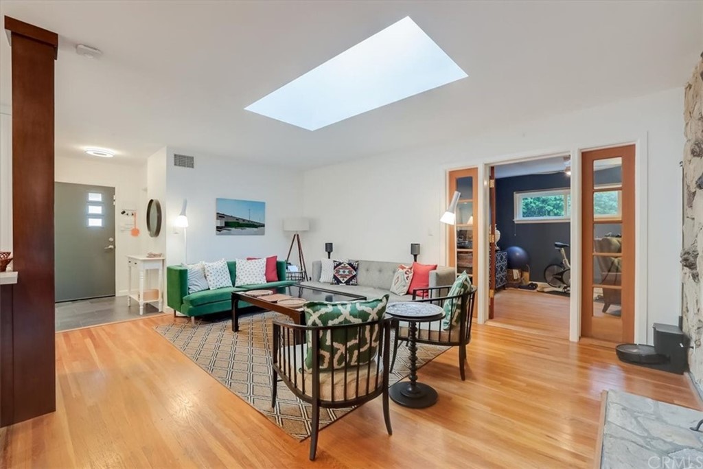 13040 Delano Street Van Nuys, CA 91401 - Photo 6 of 64 a view of a dining room with furniture and wooden floor