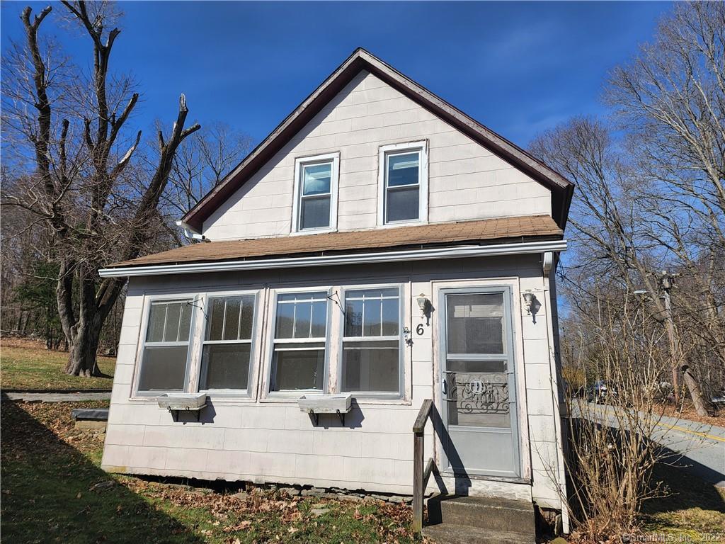6 Ridge Road Sprague, CT 06330 - Photo 1 of 1 a view of a house with backyard sitting area and porch