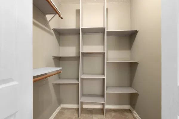 a view of an empty walk in closet
