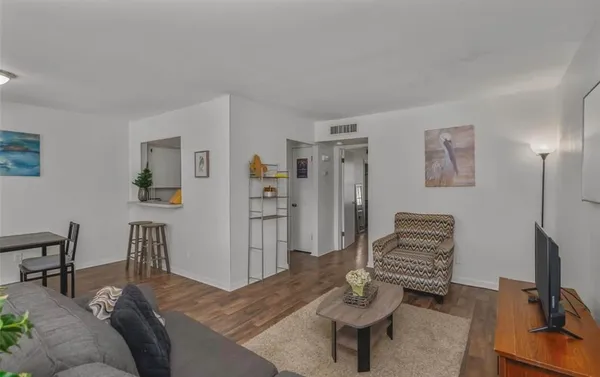 a view of a livingroom with furniture