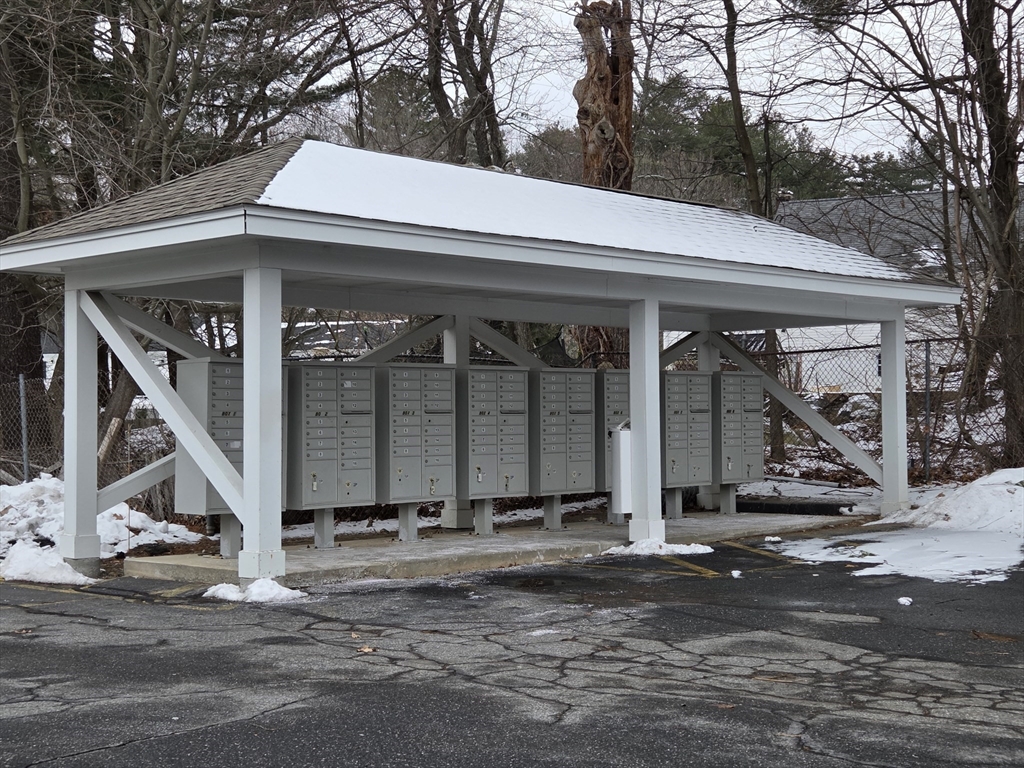 586 Boston Post Road East, Unit 6 Marlborough, MA 01752 - Photo 17 of 17 a view of a house with backyard