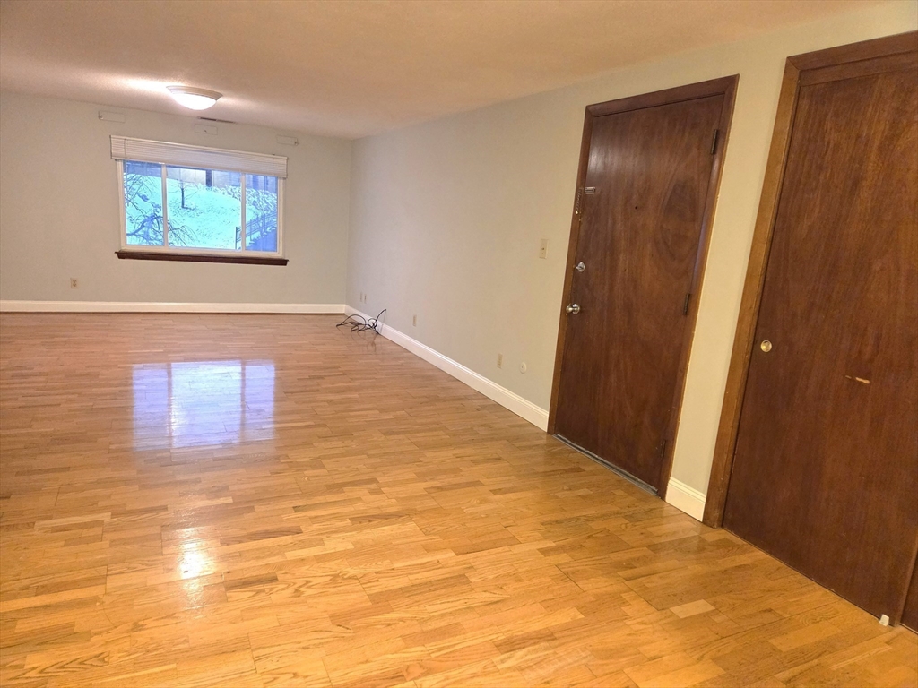 586 Boston Post Road East, Unit 6 Marlborough, MA 01752 - Photo 7 of 17 a view of an empty room