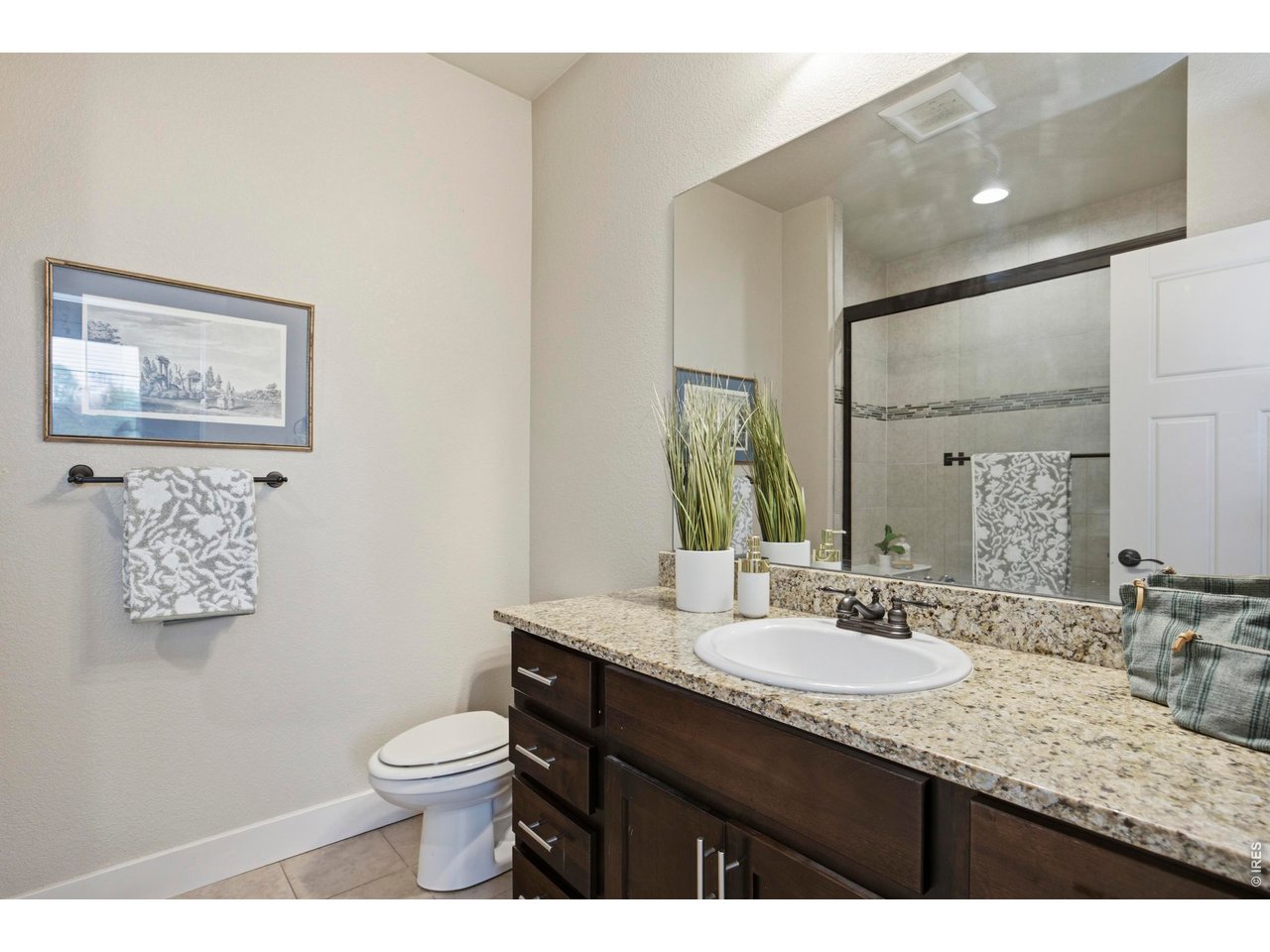 2163 Scarecrow Road Fort Collins, CO 80525 - Photo 17 of 25 Primary Bathroom with Glass Shower Tub
