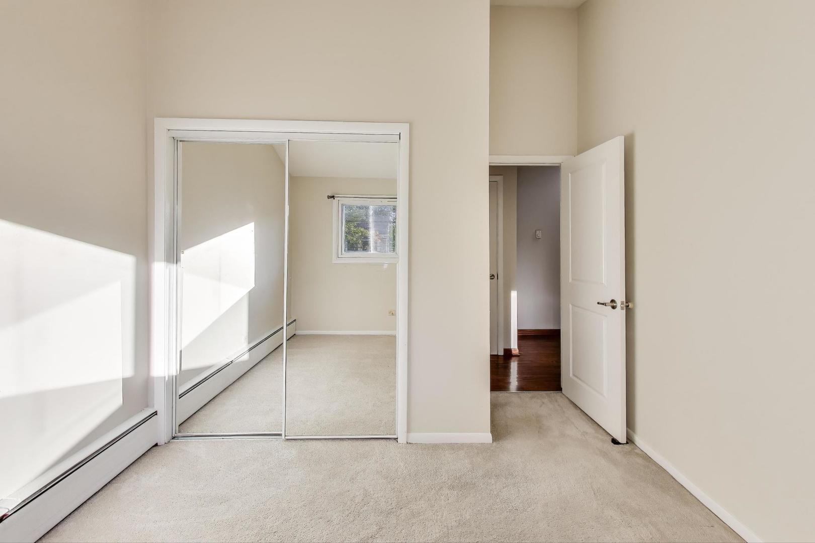 9454 Potter Road Des Plaines, IL 60016 - Photo 20 of 33 a view of an empty room and window