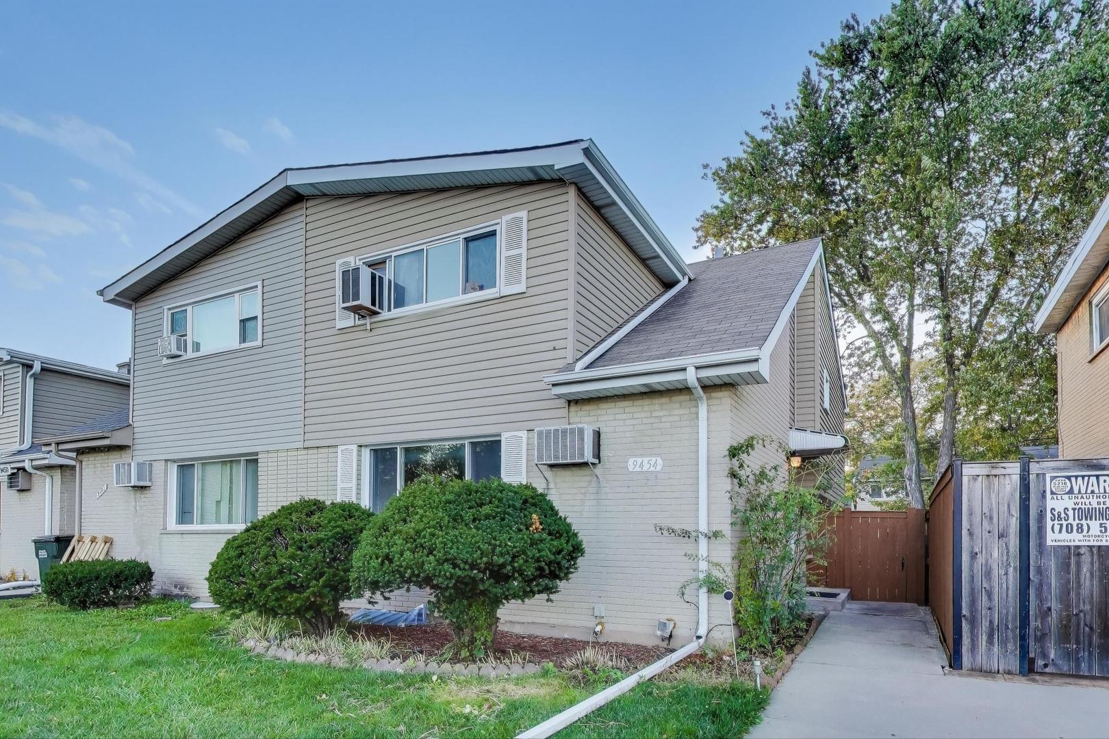 9454 Potter Road Des Plaines, IL 60016 - Photo 2 of 33 a front view of a house with a yard and trees