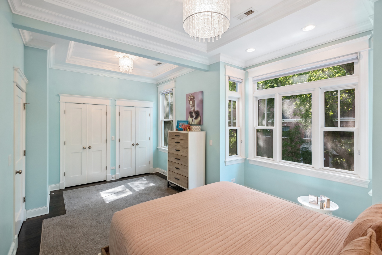 2413 North Orchard Street Chicago, IL 60614 - Photo 19 of 33 a bedroom with a large bed and a large window