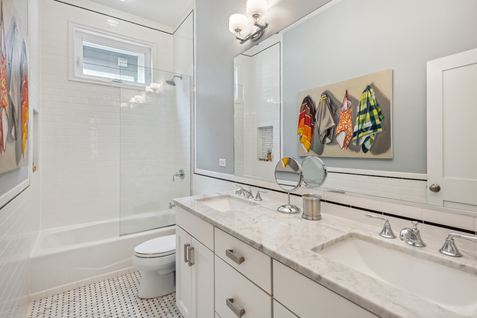 2413 North Orchard Street Chicago, IL 60614 - Photo 21 of 33 a bathroom with a granite countertop sink a toilet a shower and a mirror