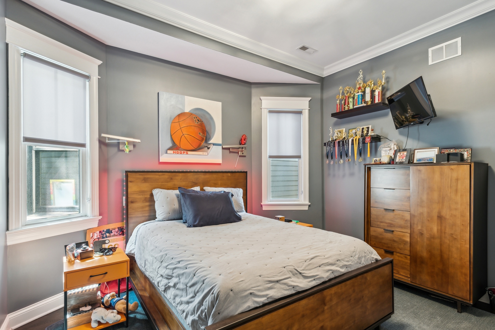 2413 North Orchard Street Chicago, IL 60614 - Photo 23 of 33 a bedroom with a bed and wooden floor