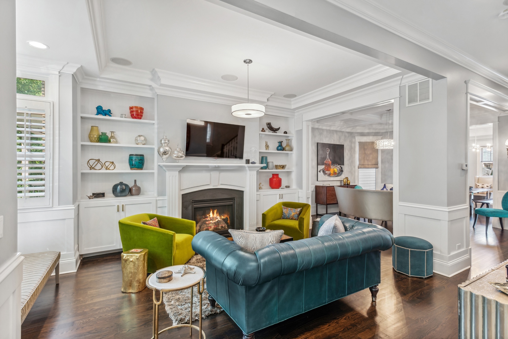 2413 North Orchard Street Chicago, IL 60614 - Photo 3 of 33 a living room with furniture fireplace and a flat screen tv