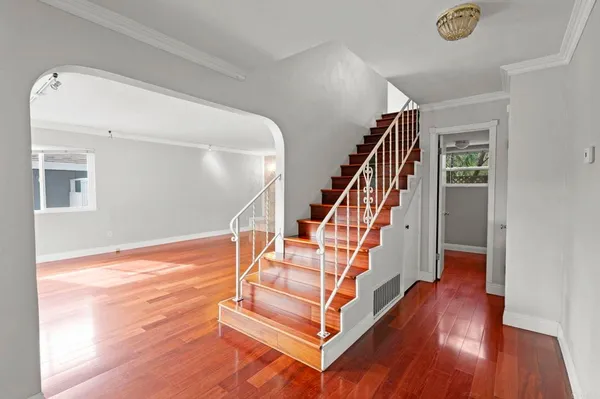 a view of entryway with wooden floor
