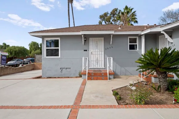 a view of a house with a patio