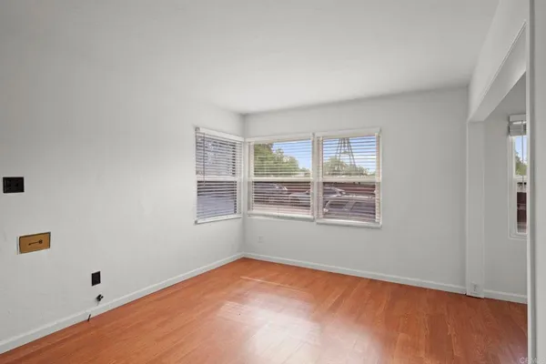 wooden floor and window in a room