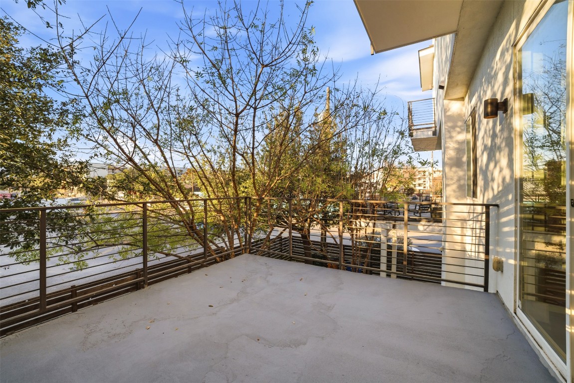1801 East 2nd Street, Unit 2 Austin, TX 78702 - Photo 11 of 34 Large patio with views off of the kitchen.