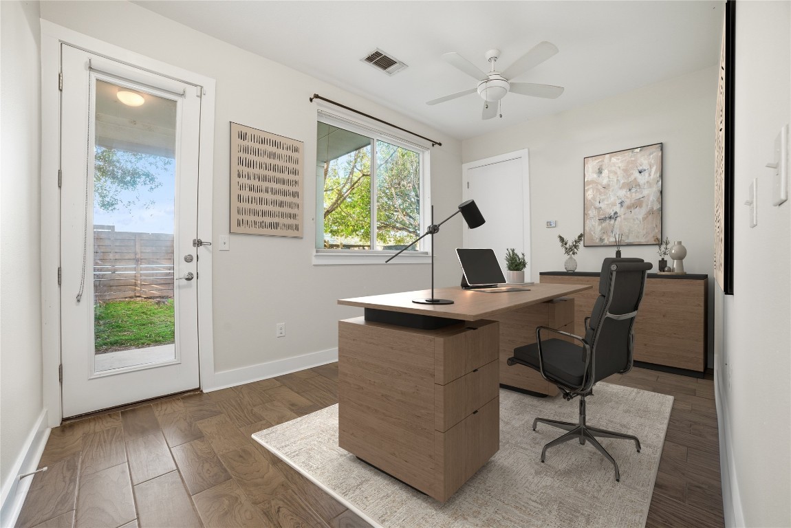 1801 East 2nd Street, Unit 2 Austin, TX 78702 - Photo 25 of 34 Virtually staged - Third bedroom that would also make the perfect office. Opens up to the backyard + back patio. Alley access from the backyard too, so has its own private entrance.