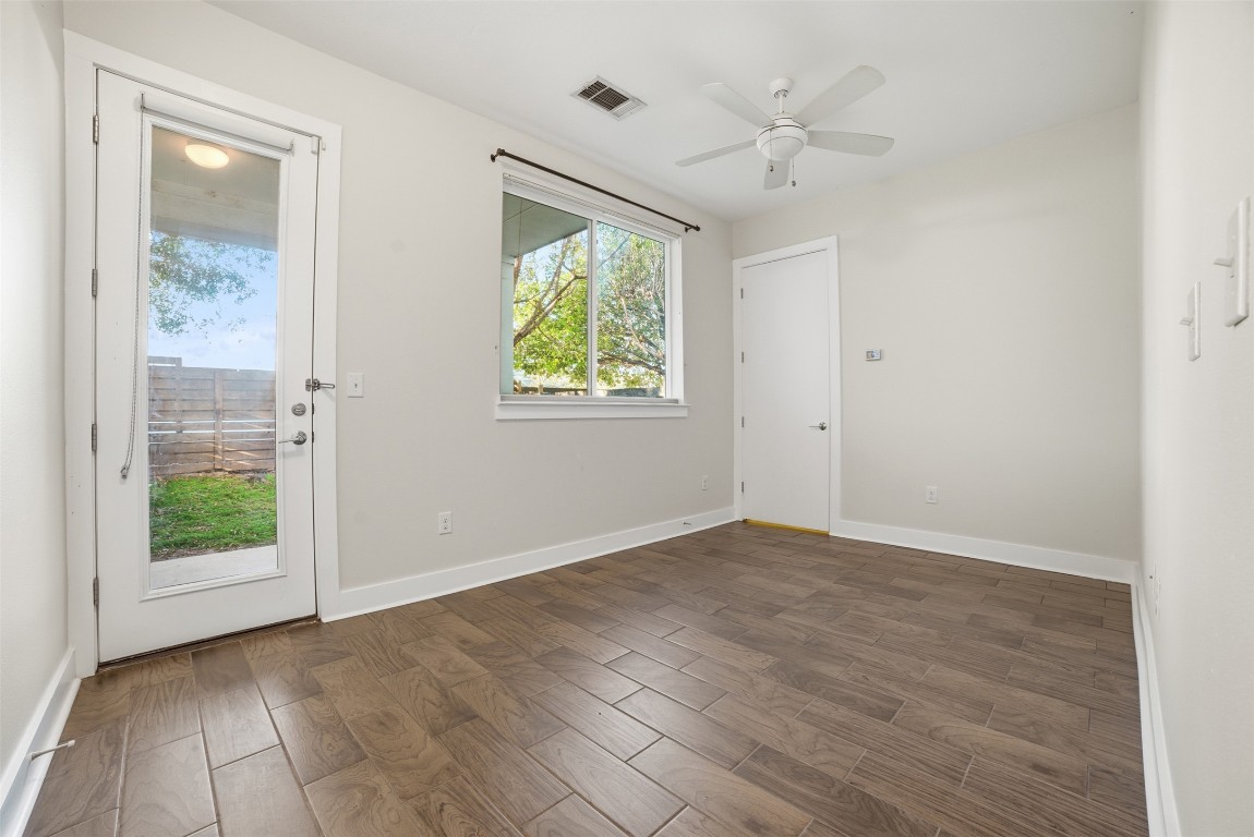 1801 East 2nd Street, Unit 2 Austin, TX 78702 - Photo 26 of 34 Third bedroom that would also make the perfect office. Opens up to the backyard + back patio. Alley access from the backyard too, so has its own private entrance.