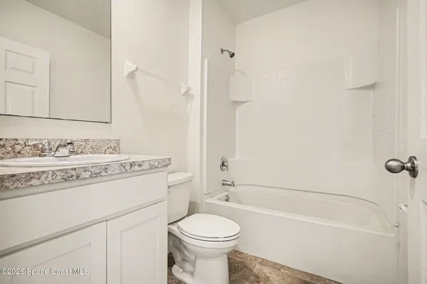 a view of a lake with a city