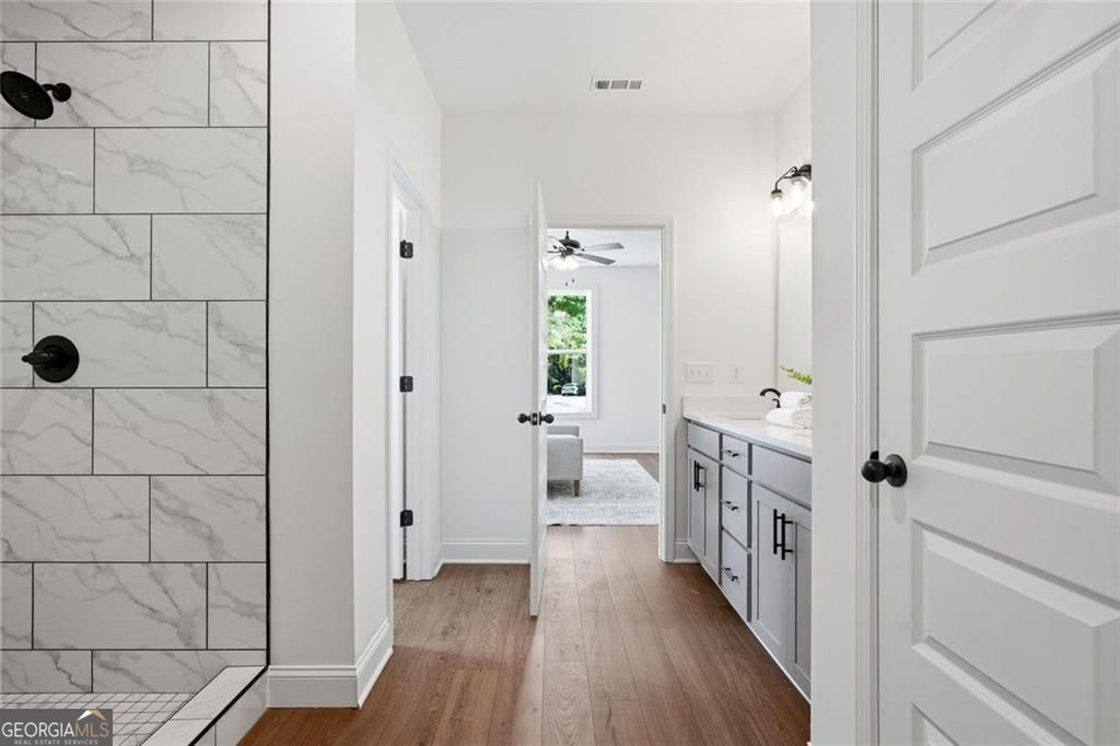 160 Loyd Road Mansfield, GA 30056 - Photo 25 of 52 a bathroom with a sink a toilet and shower