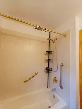 a bathroom with a bath tub