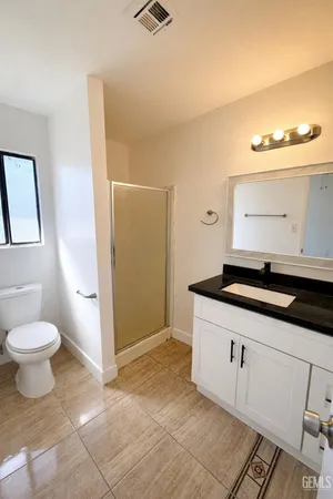 a bathroom with a sink and a toilet