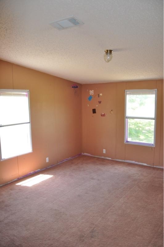 9960 Bellbrook Road Milton, FL 32583 - Photo 19 of 29 an empty room with windows