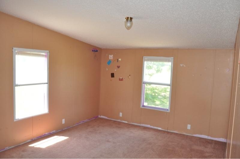 9960 Bellbrook Road Milton, FL 32583 - Photo 20 of 29 an empty room with windows