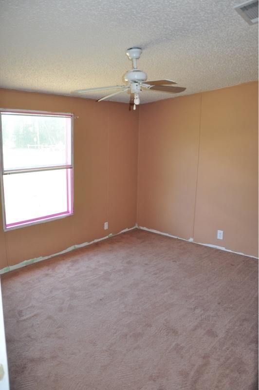 9960 Bellbrook Road Milton, FL 32583 - Photo 21 of 29 an empty room with a window