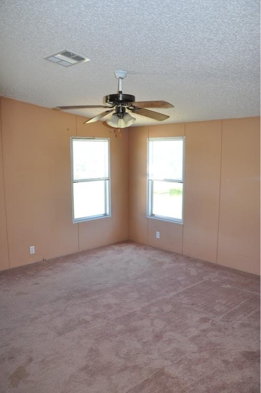 9960 Bellbrook Road Milton, FL 32583 - Photo 23 of 29 a view of an empty room with a window
